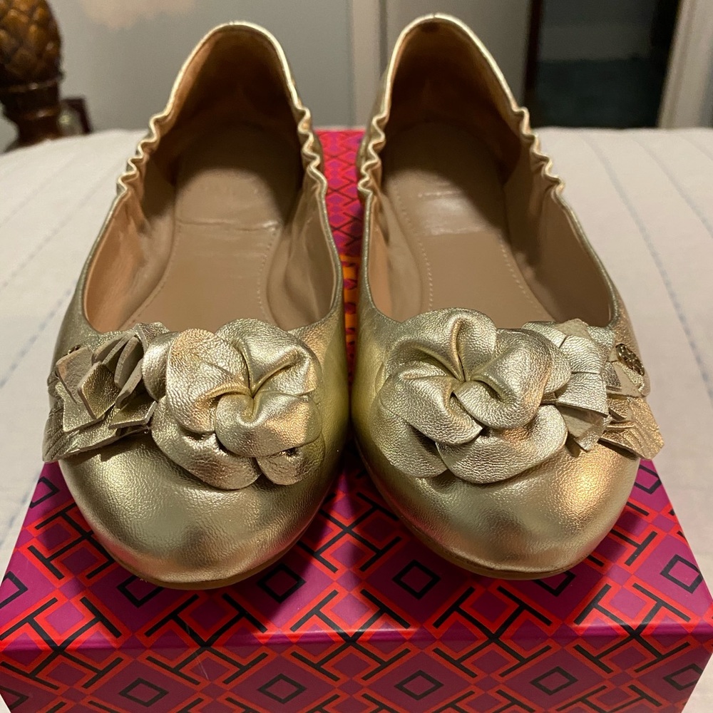 Beautiful gold Tory Burch flats, worn once.